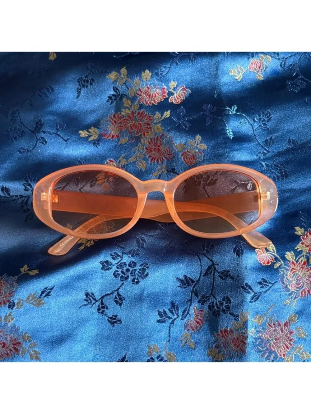 Orange Tinted Oval Sunglasses